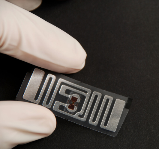 RFID inlay in a converted label construction